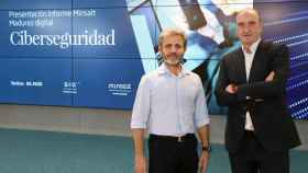 Carlos Beldarrain, director del servicio de desarrollo de Indra ,y Luis Álvarez, consejero delegado de SIA, en la presentación del informe sobre Madurez Digital en Ciberseguridad / EP