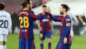 Mingueza y Messi celebrando el gol del central contra el Huesca / FC Barcelona