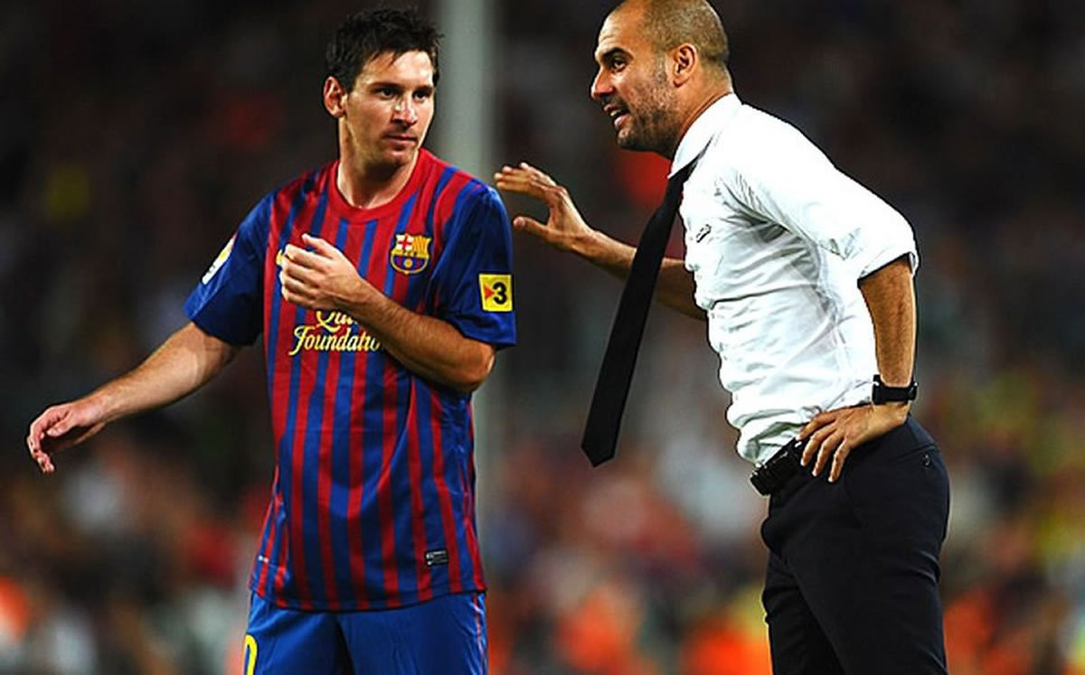 Guardiola en un partido con Messi / EFE