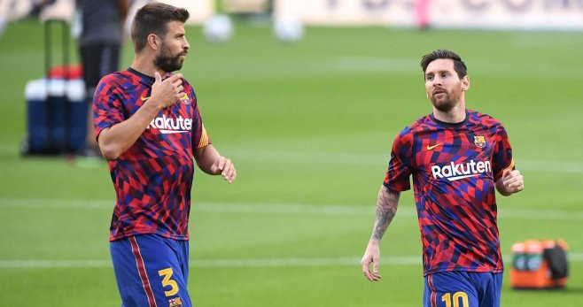 Gerard Piqué y Leo Messi, en un calentamiento | EFE