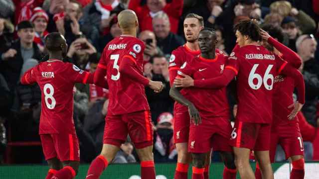 Los jugadores del Liverpool de Klopp celebran juntos una victoria en la Premier League / EFE