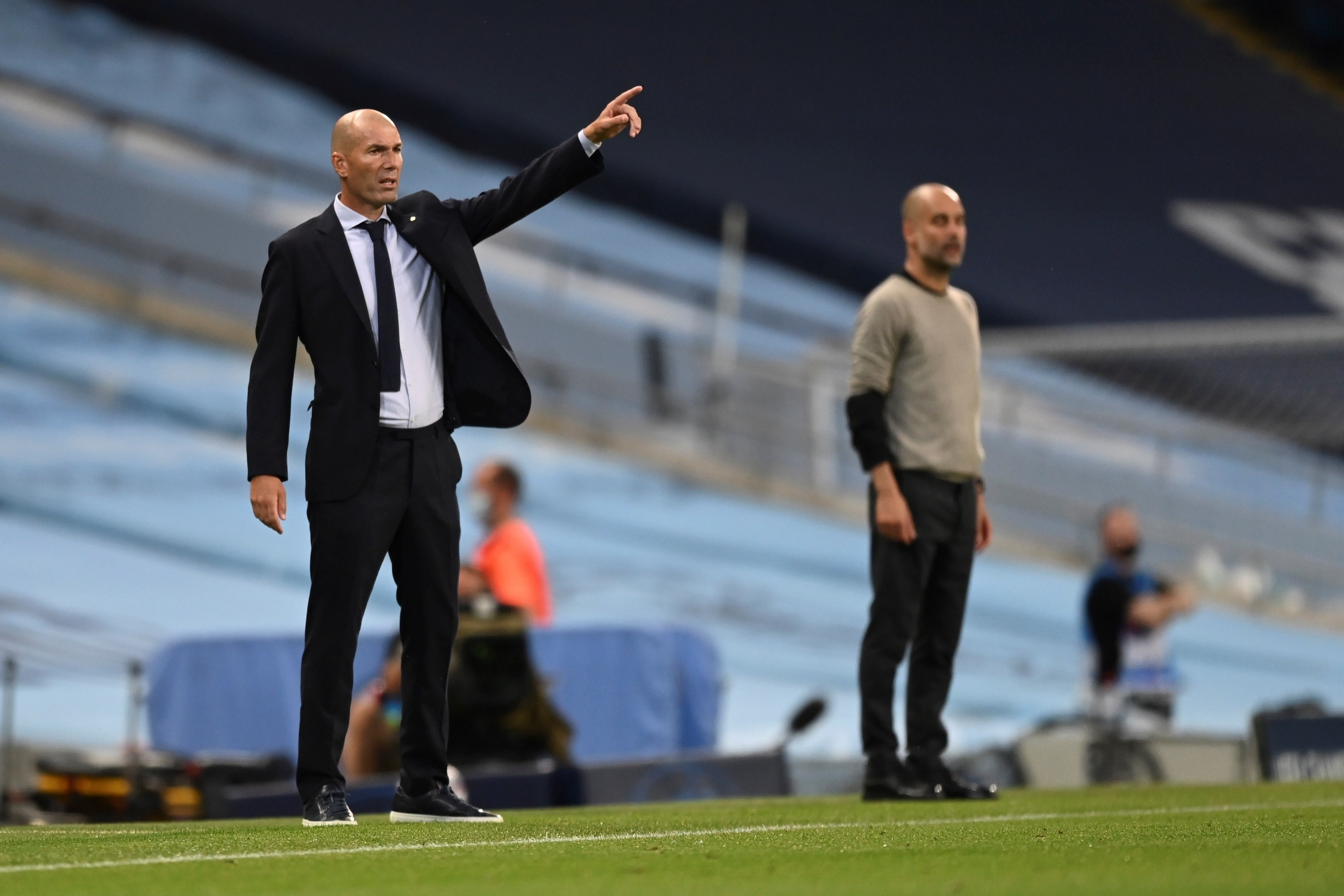 Guardiola y Zidane durante el encuentro /EFE