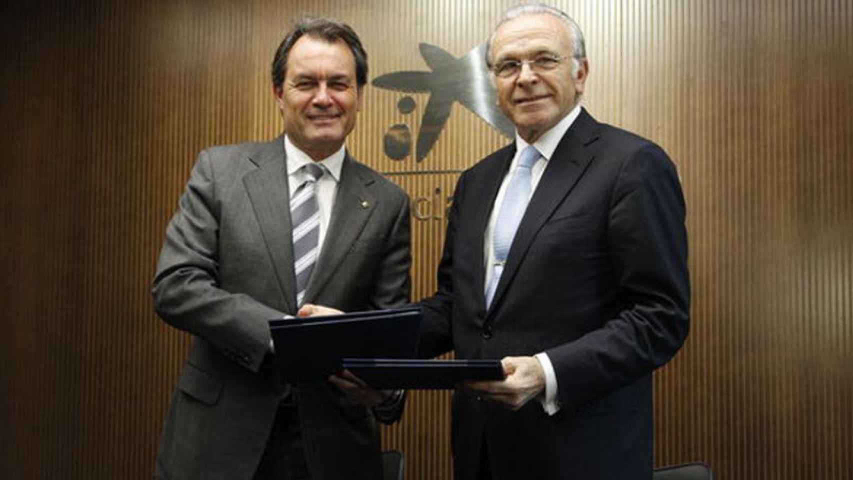 Artur Mas, con el presidente de La Caixa, Isidre Fainé.