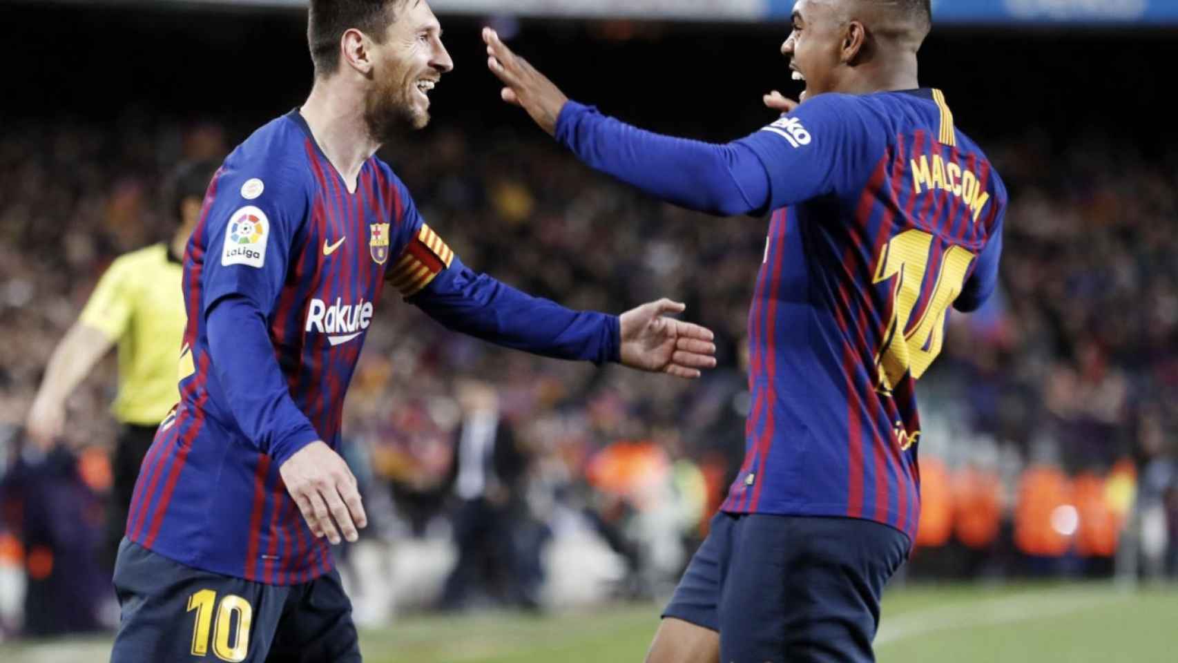 Una foto de Messi y Malcom celebrando un gol ante el Atlético de Madrid / FCB