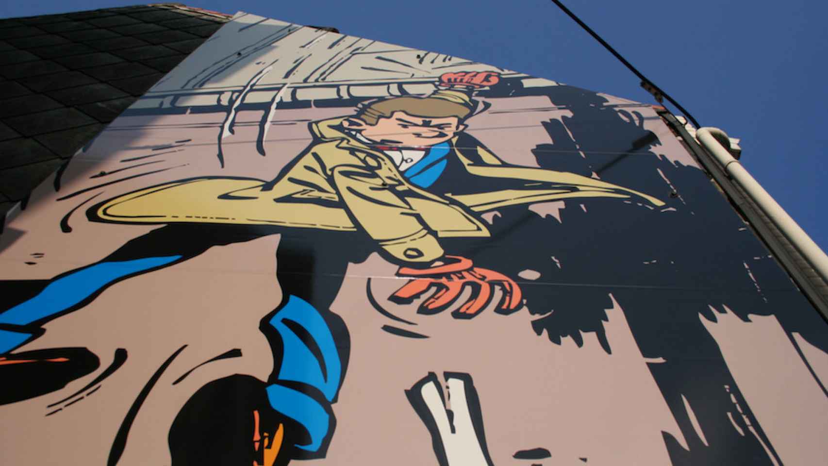 Dibujo del persona de cómic Gil Jourdan en la pared de un edificio / FLICKR