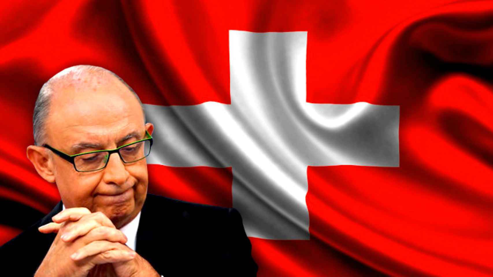Cristóbal Montoro, actual ministro de Hacienda y Administraciones públicas delante una bandera suiza / FOTOMONTAJE DE CG