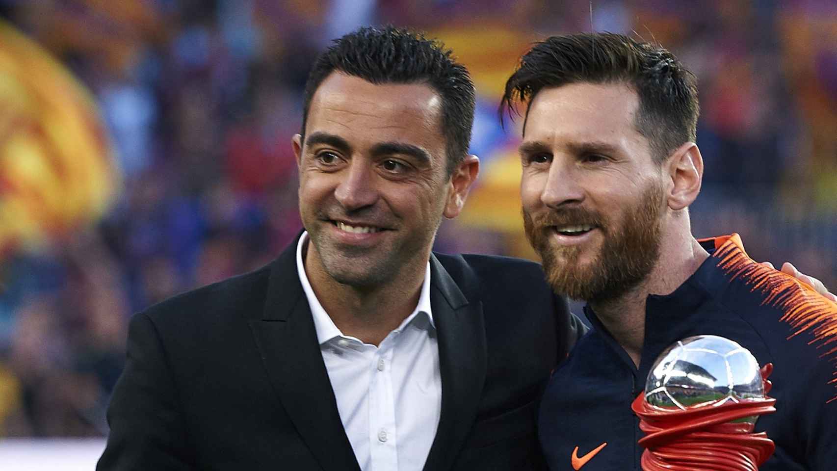 Xavi, junto a Leo Messi en una imagen de archivo | EFE