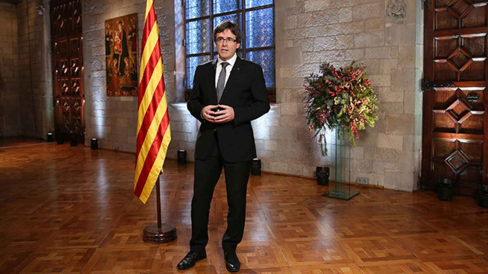 El presidente de la Generalitat, Carles Puigdemont, durante su primer discurso de Nochevieja / JORDI BEDMAR