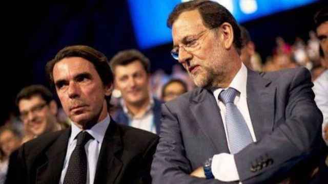 El expresidente de honor del PP, José Maria Aznar, junto al actual presidente del Gobierno, Mariano Rajoy / EFE