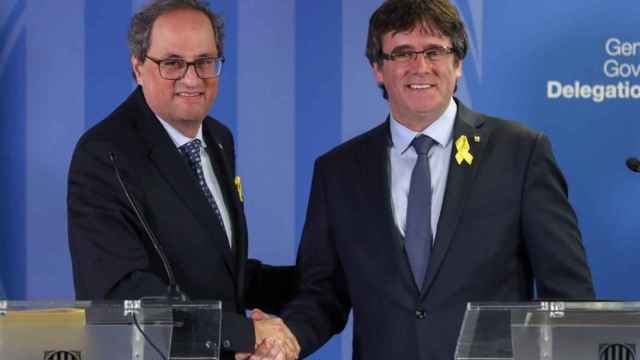 Quim Torra junto a Carles Puigdemont en un último encuentro en Bruselas / EFE