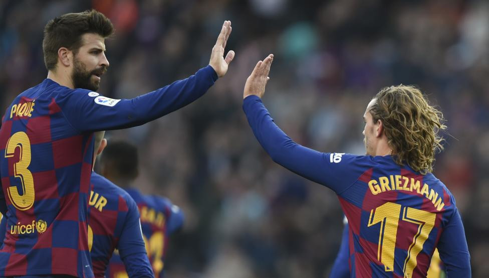 Griezmann y Piqué, en un partido con el Barça | EFE