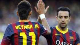Neymar y Xavi en un partido con el Barça /REDES