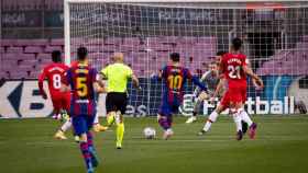 Messi en un mano a mano con Aarón Escandell / FC Barcelona