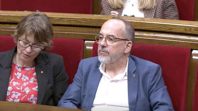 El 'conseller' de Derechos Sociales del Govern de la Generalitat de Cataluña, Carles Campuzano, durante su moción este jueves / PARLAMENT