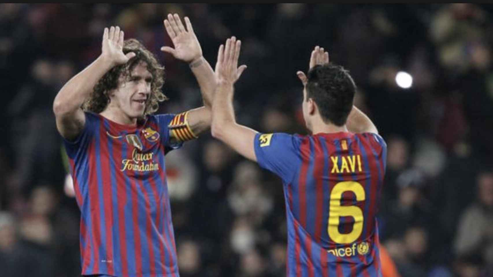 Una foto de Carles Puyol y Xavi Hernández durante un partido del Barça / EFE