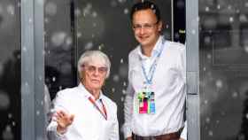 El patrón de la F1, Bernie Ecclestone (i), y el ministro de Asuntos Exteriores de Hungría, Peter Szijjarto.