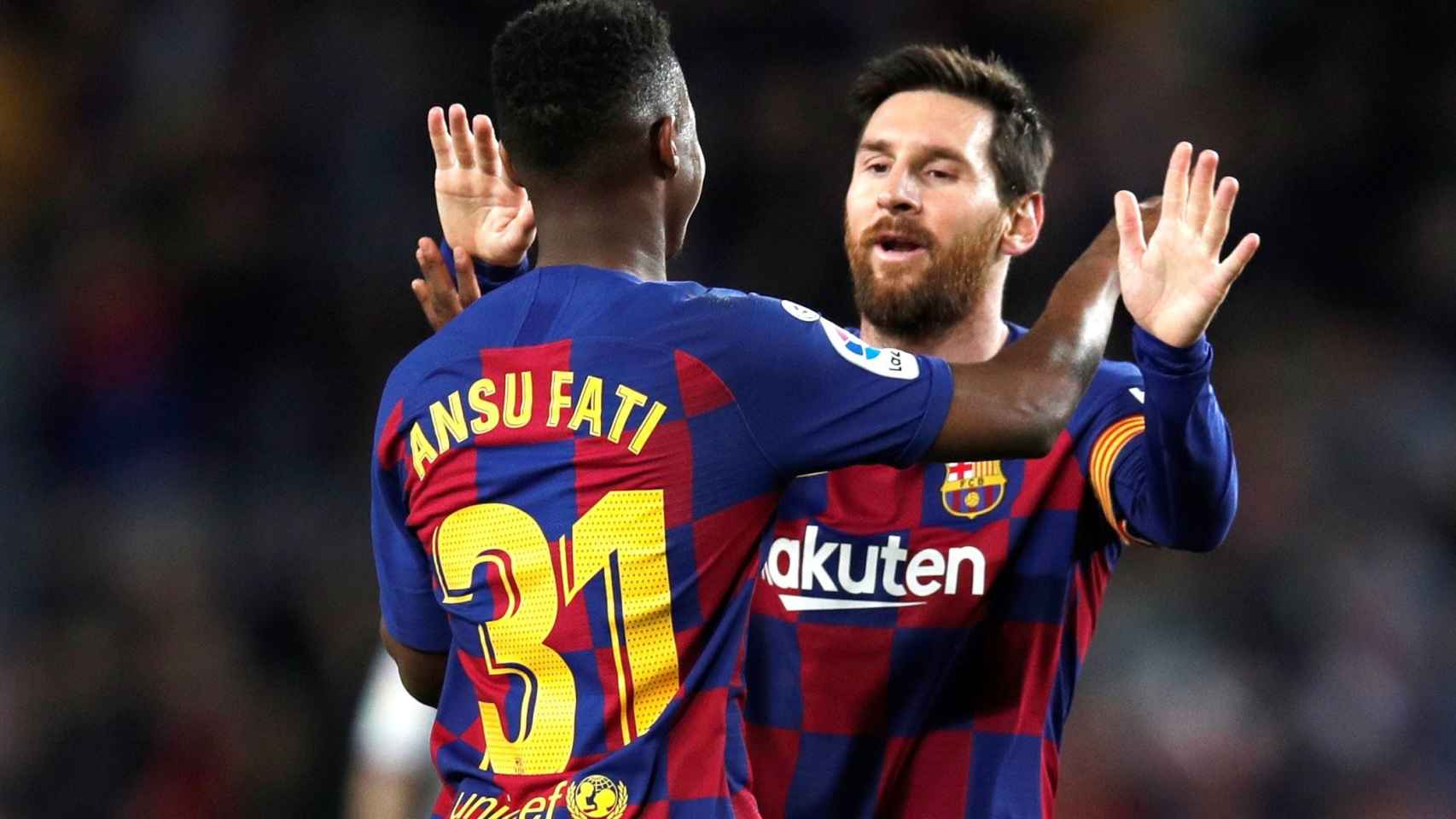 Ansu Fati celebra con Messi sus goles al Levante / EFE