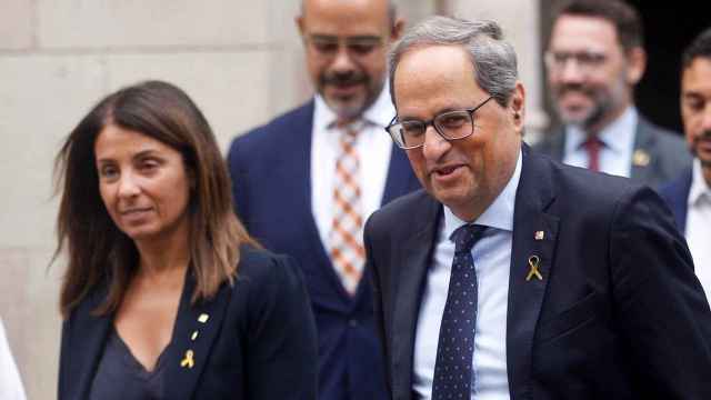 Meritxell Budó, junto al presidente de la Generalitat, Quim Torra / EFE