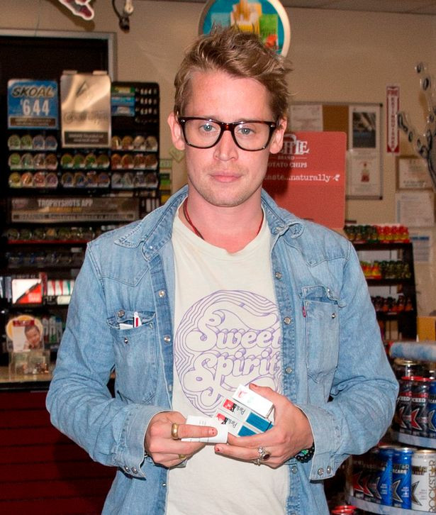 Macaulay Culkin was seen picking up Three packets of Parliament Cigarettes as a Gas station on Sunse