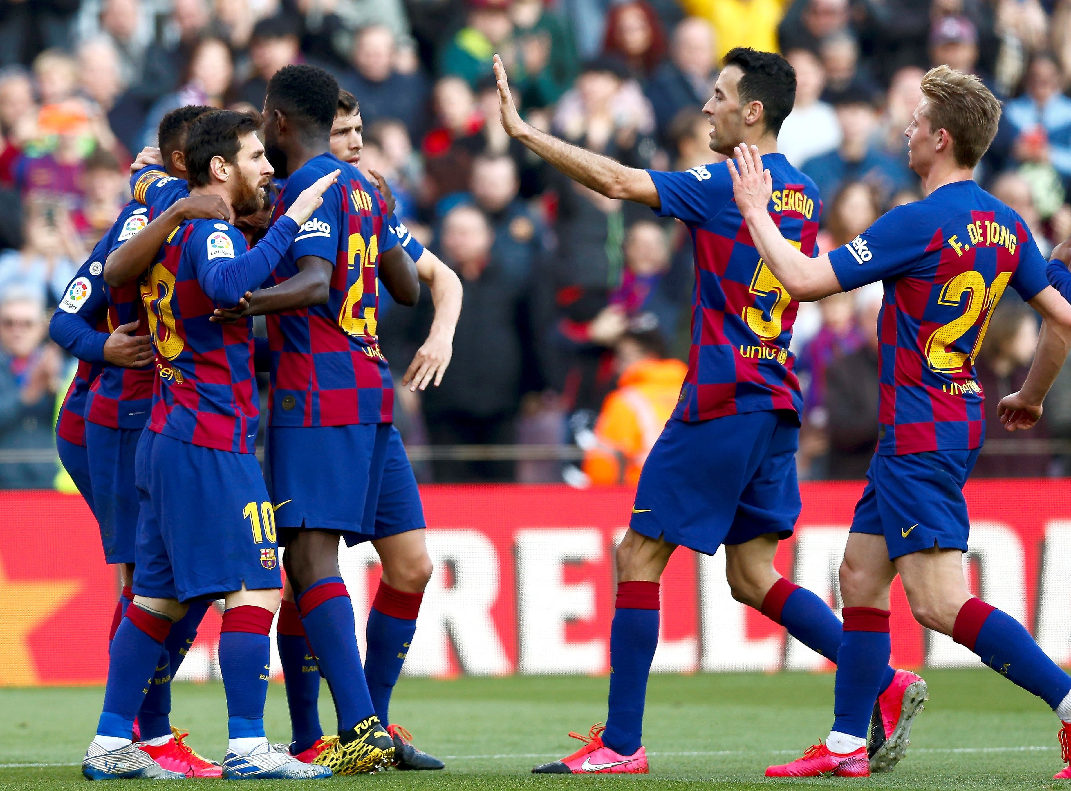 Los jugadores del Barça celebran su primer gol ante el Getafe en Liga / EFE