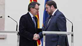 Mas y Junqueras, el 19 de diciembre de 2012, tras la firma del pacto de gobernabilidad en el Parlamento autonómico de Cataluña