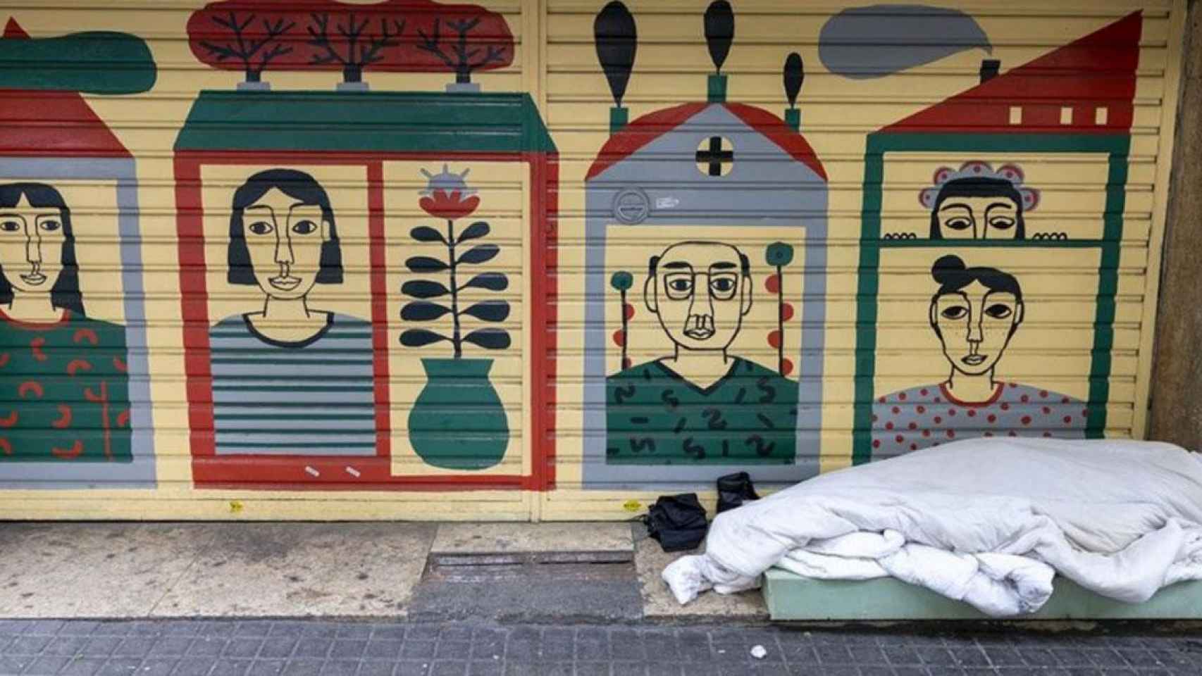 Un sintecho duerme en las calles de Barcelona durante el estado de alarma / ARRELS