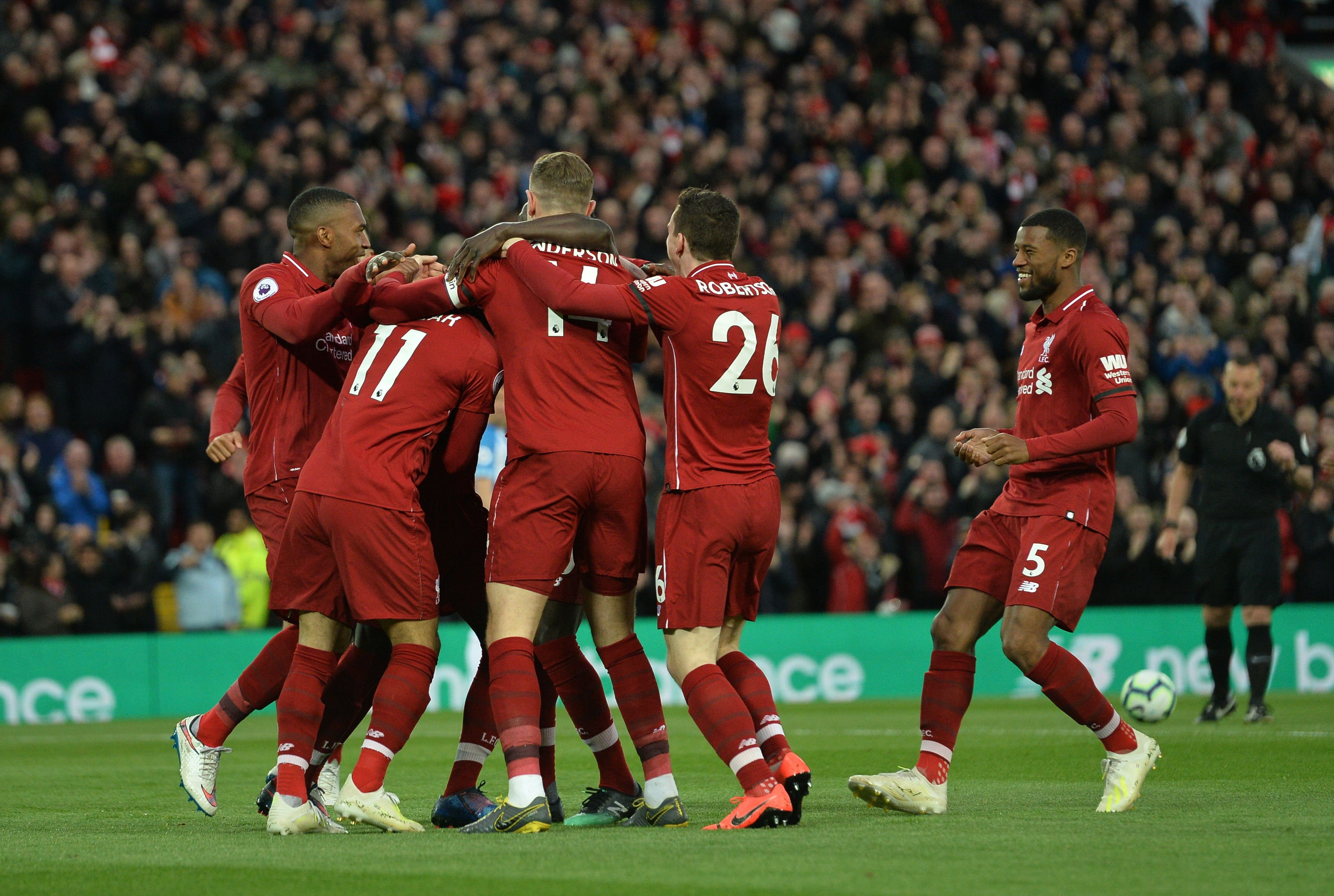 El Liverpool celebra el primer gol frente al Huddersfield / EFE