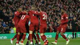 El Liverpool celebra el primer gol frente al Huddersfield / EFE