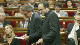 De izquierda a derecha, Neus Munté, Artur Mas y Antonio Baños en el Parlament este martes