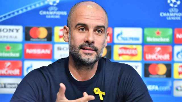 Pep Guardiola en una rueda de prensa del Manchester City / EFE