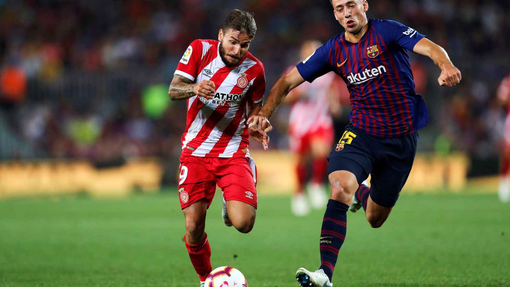Una foto de Lenglet y Portu durante el partido Barça - Girona / EFE