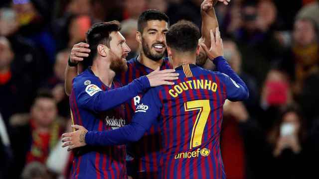 Coutinho, Messi y Luis Suárez celebran un gol en el Barça-Eibar / EFE