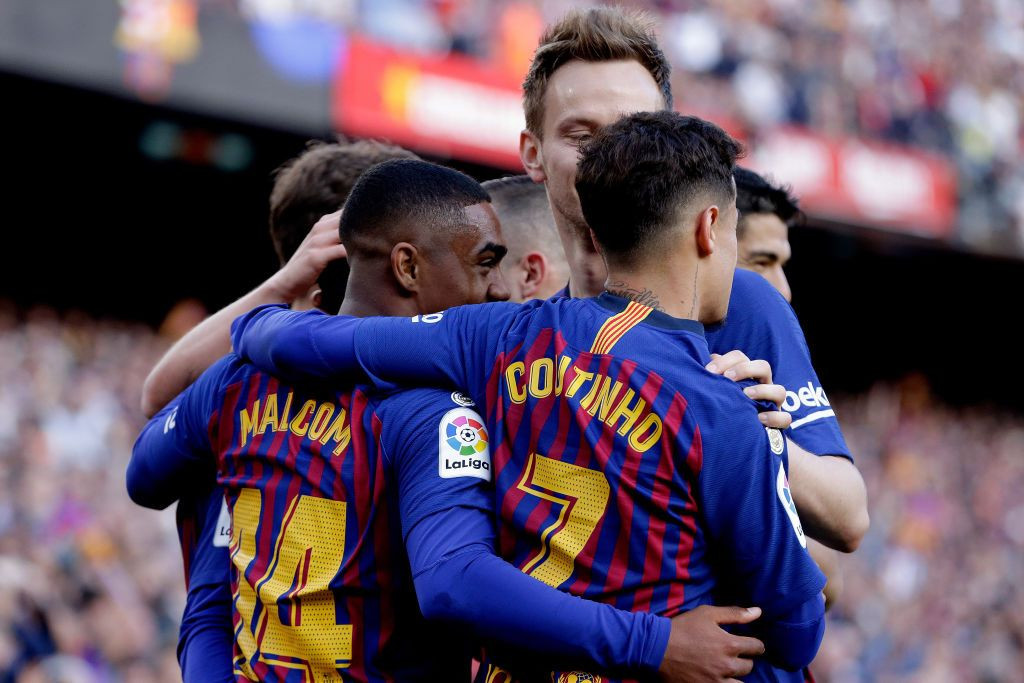Malcom, Coutinho y  Rakitic celebrando un gol con el Barça / EFE