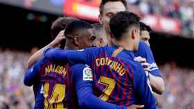 Malcom, Coutinho y  Rakitic celebrando un gol con el Barça / EFE