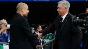 Pep Guardiola y Carlo Ancelotti se saludan antes del Real Madrid-ManchesterCity / EFE