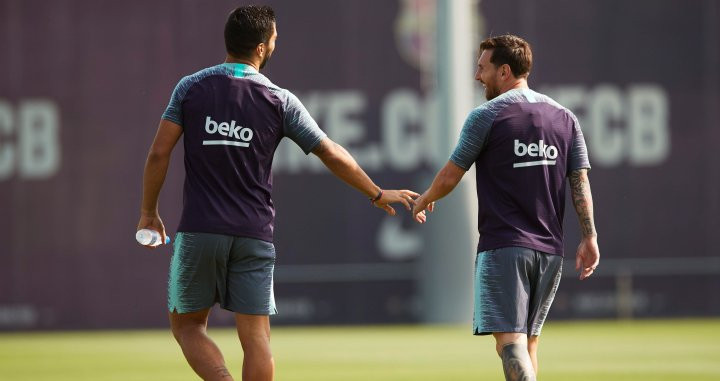 Luis Suárez y Messi durante un entrenamiento / EFE