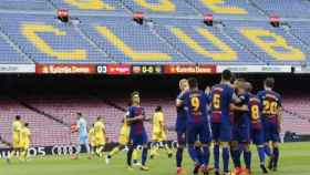 El Barça celebrando un gol contra Las Palmas en el Camp Nou en el partido de fútbol a puerta cerrada / EFE