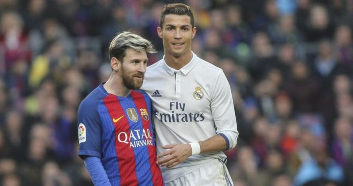 Leo Messi y Cristiano Ronaldo, en un clásico | EFE