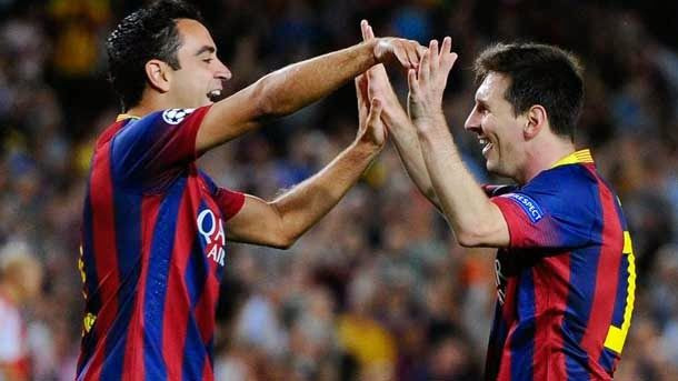 Xavi celebra un gol de Messi  / ARCHIVO