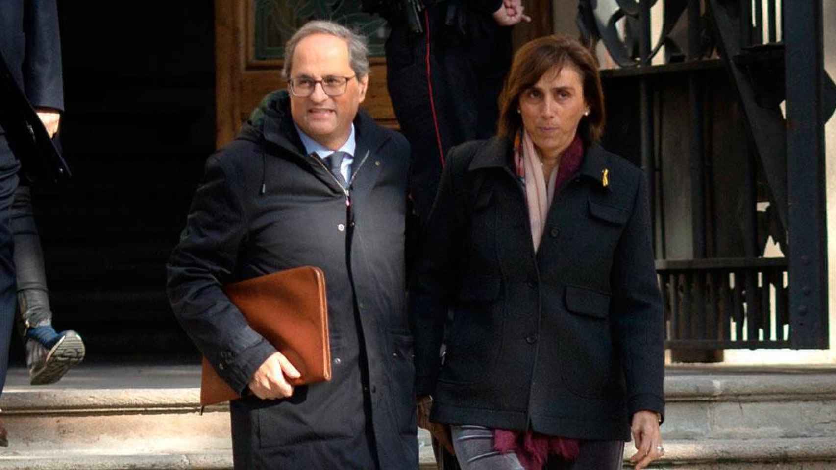 El presidente de la Generalitat, Quim Torra, acompañado de su mujer, Carola Miró, a su salida del TSJC / EFE
