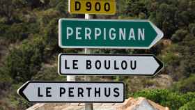 Cartel señalando la localidad francesa de Perpiñán, en francés / NAMACHA - PIXABAY