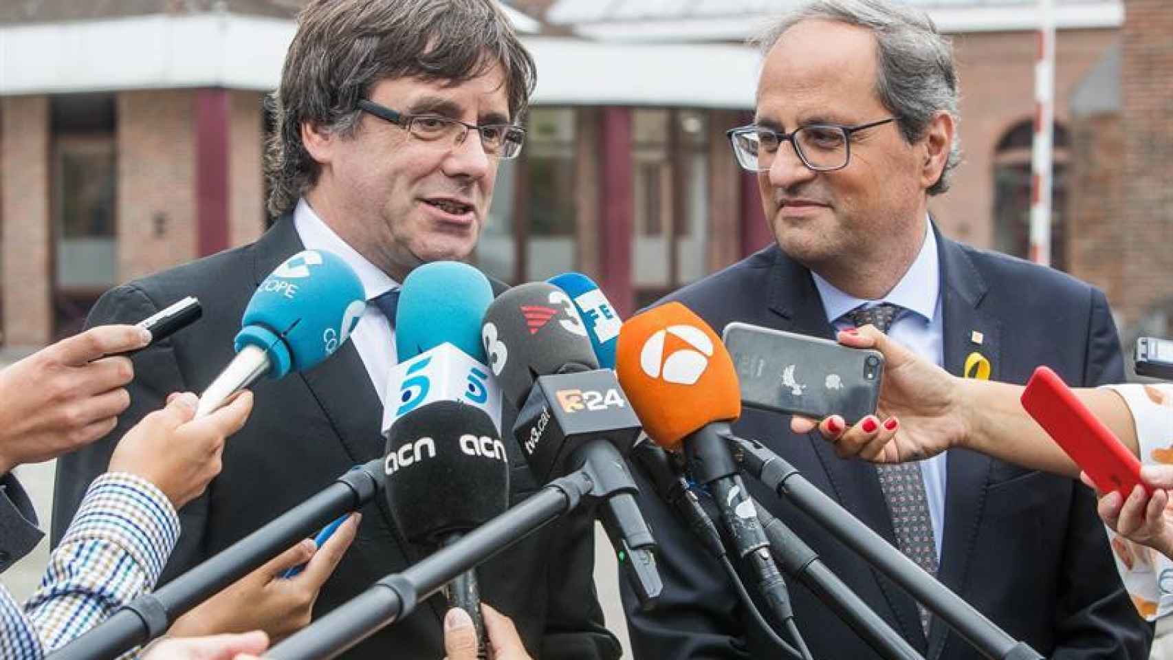 El expresidente catalán y líder de Junts per Catalunya (JxCat), Carles Puigdemont (i), y el presidente de la Generalitat, Quim Torra / EFE