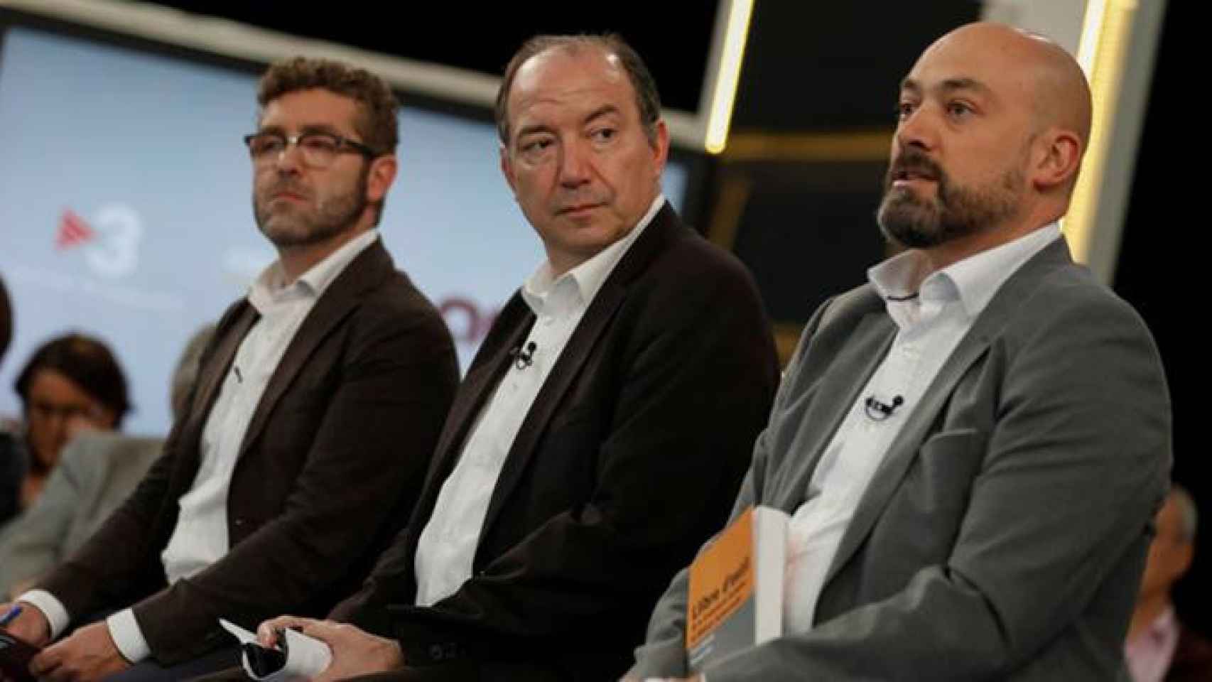 Saul Gordillo (Catalunya Ràdio), Vicent Sanchis (TV3) y Marc Colomer (ACN), de derecha a izquierda, en un programa de la televisión catalana sobre la intervención de los medios públicos / CG