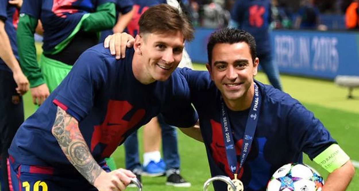 Messi, junto a Xavi, en la celebración de la Champions de Berlín / EFE