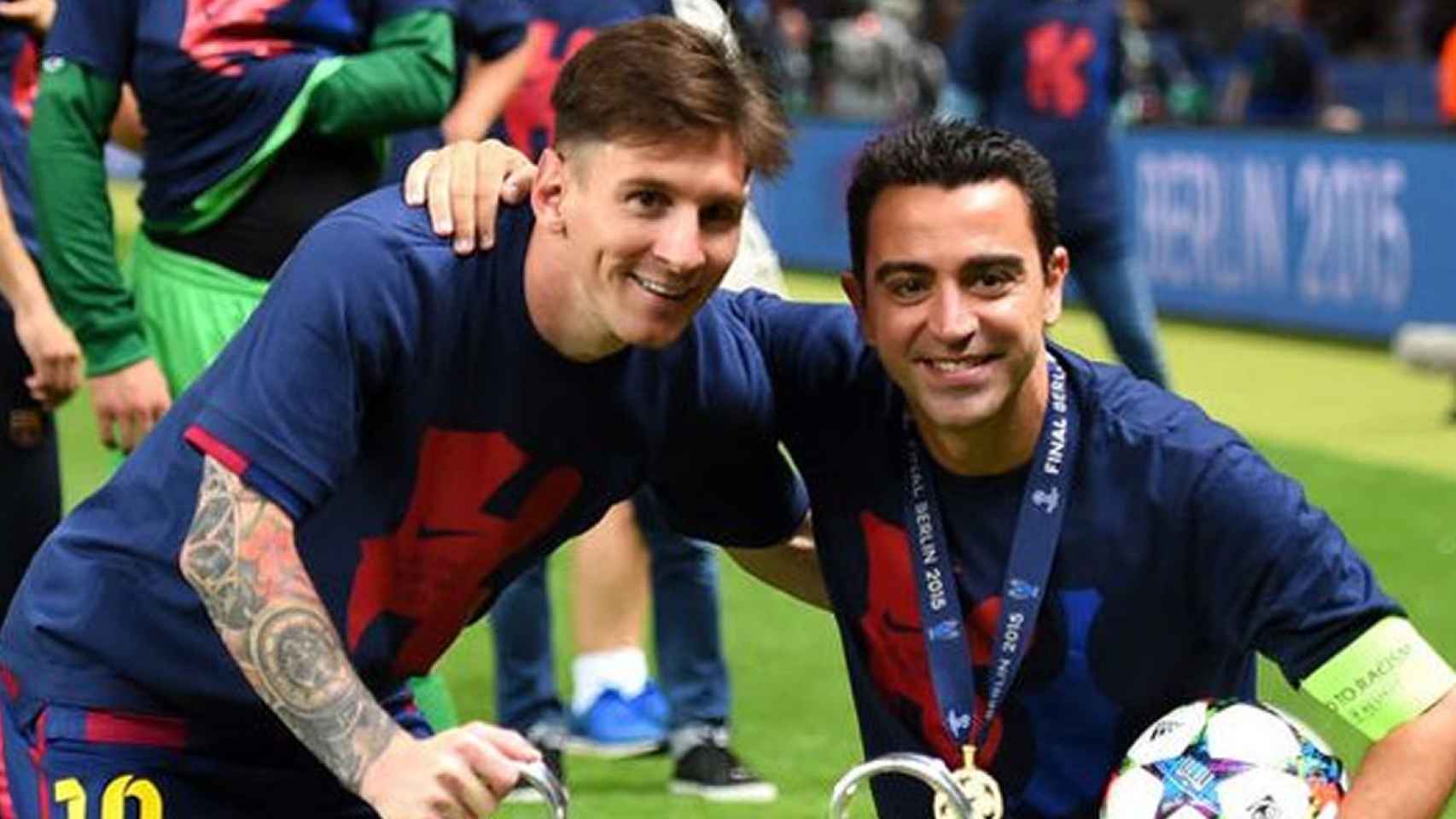 Messi, junto a Xavi, en la celebración de la Champions de Berlín / EFE