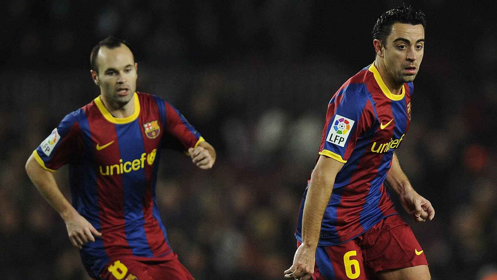 Xavi e Iniesta, en un partido con el Barça | EFE
