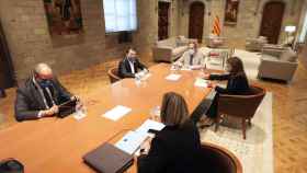 El expresidente de la Generalitat, Quim Torra, junto a Pere Aragonès presidiendo una reunión del Procicat para abordar los rebrotes de Covid-19 en Lleida / GOVERN