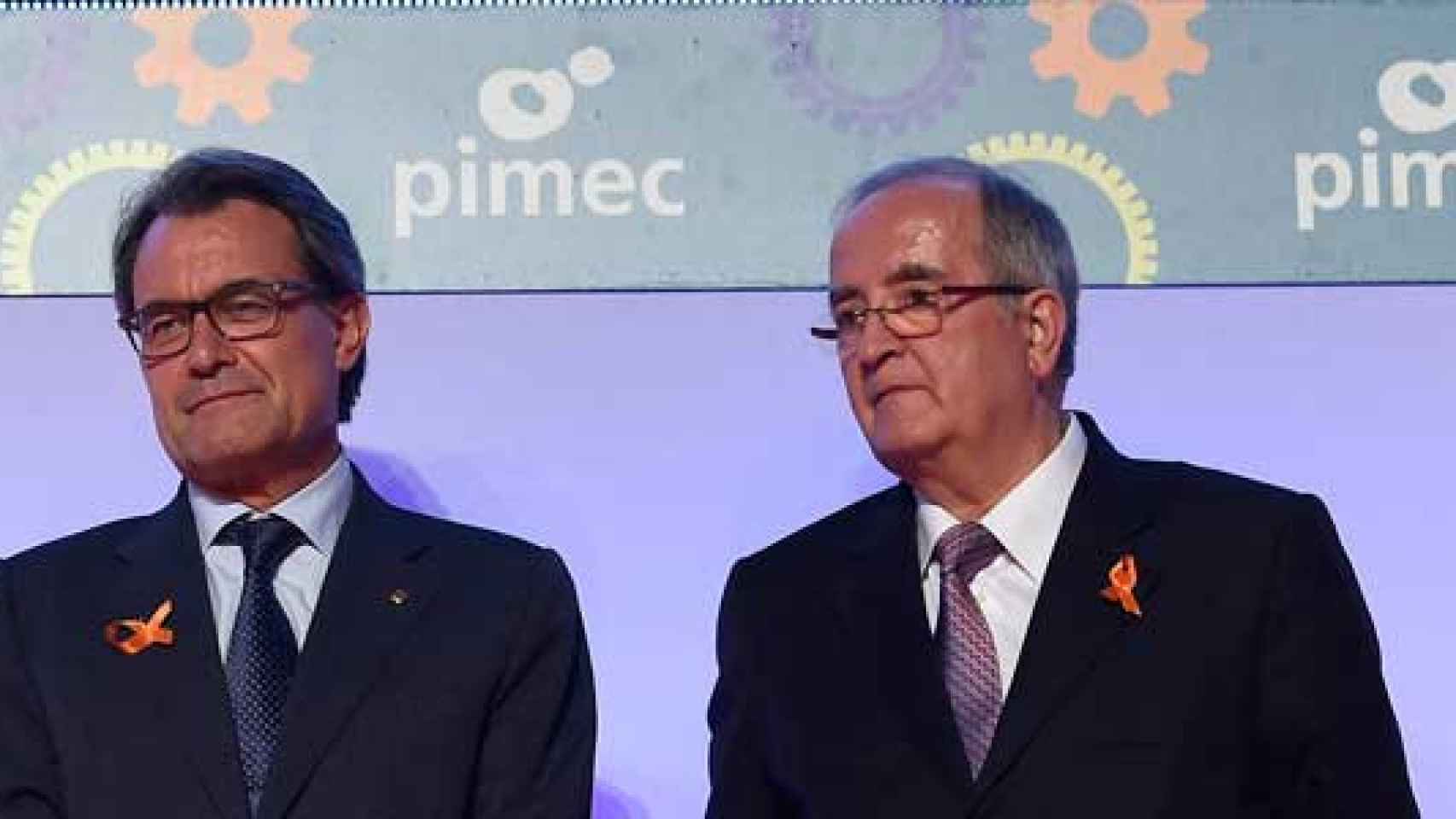 El presidente de la Generalitat, Artur Mas (izquierda), junto al líder de Pimec, Josep González (derecha)