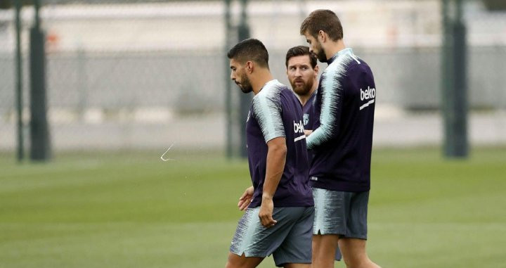 Leo Messi junto a sus confidentes en el Barça, Luis Suárez y Piqué | EFE