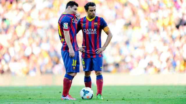 Xavi junto a Messi en un encuentro del FC Barcelona / EFE